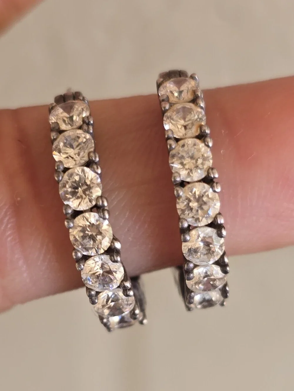 Elegant channel set sparkling CZ diamonds half filigree hoop earrings